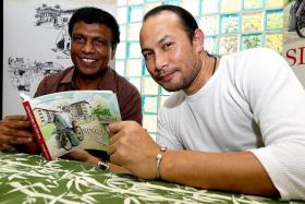 FOR SINGAPORE: Mr James Suresh (left) and Mr Syed Ismail with their book, Singapore In The 60s.