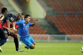 FELLED: LionsXII&#039;s Hafiz Abu Sujad falling after a challenge from behind by PDRM&#039;s Jaime Braganca.