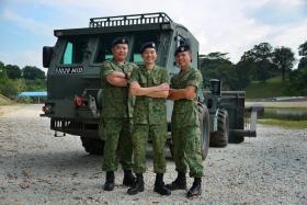 WINNERS: The 321st Battalion is the Best NS Combat Engineers Unit this year. Some of its key appointment holders include (from left) 2SG Quek Zhi Yuan (deputy chief clerk), Major (NS) Tan Chee Ming (commanding officer) and 2WO Poh Choon Beng (regimental sergeant major).