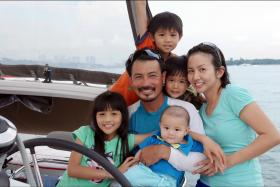 Local actor Darren Lim with his wife Evelyn Tan and their four children.