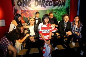 EXCITED: Fans outside Madame Tussauds Singapore on 1D Exclusive Preview Night.