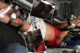 A drunk man aboard a Serbian Airlines flight from Hong Kong to Vladivostok was restrained by fellow passengers with seat belts and tape.