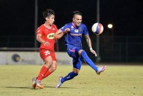 &quot;I’m very happy to have this chance, but I’m sad to leave Warriors, because I am leaving behind many friends in Singapore.&quot; - Warriors’ Nicolas Velez (in blue, fending off Home’s Ang Zhi Wei in last night’s match)