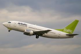 An airBaltic co-pilot who failed a breath test had a blood alcohol level that was seven times over the legal limit to fly.