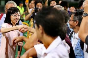 FIRST-TIMER: Ms Han Hui Hui at her rally at Delta Hockey Pitch yesterday.
