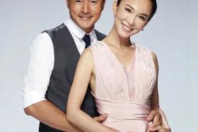 HAPPY FAMILY: Wong and Lee got netizens talking after they uploaded this photo onto their Facebook accounts yesterday, with the caption: &quot;Good afternoon! We will be shouldering a new responsibility!&quot; This led to speculation that they were expecting their second child.