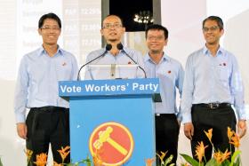The Workers&#039; Party team for East Coast GRC, (from left) Mr Gerald Giam, Mr Mohamed Fairoz Shariff , Mr Daniel Goh and Mr Leon Perera thanking supporters at Hougang Stadium on Sept 11.