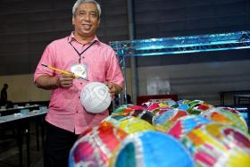 FOR THE RECORD: Mr Ika Zahri (above) will be conducting workshops for batik painting on lanterns at the SingEx Mid-Autumn Festival. The event will attempt to set the Singapore record for the most number of hand-painted lanterns.