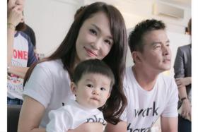 Fann Wong (left) with baby Zed and husband Christopher Lee on the right. 