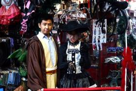 (Above) Founder of Customade Costume &amp; Merchandise Mr Sanee Neo and marketing executive Kathy Tam in their favourite Halloween costumes.