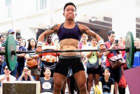 FITTEST: Ms Chew Feng Yi, 29, a civil servant, was the winner in the women’s category of the ELITE 2015 Grand Finals, an inaugural competition that aims to find the fittest in Singapore. 