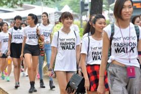 WALK THIS WAY: This year&#039;s The New Paper New Face finalists participating in the Her World Fashion Walk on Saturday at Orchard Road.