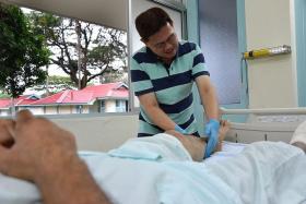 REACHING OUT: Prof Albert Teo started Touch Therapy for HIV/Aids patients in 2001 because he believes that a touch from a stranger helps heal the spirit of someone who has been ostracised.  