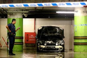 BURNT: The Mini Cooper at Basement 2 of Tampines 1 shopping mall.