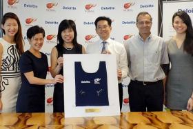 STRIKING A BALANCE: National netballers Charmaine Soh (far left) and Yu Mei Ling (far right) have benefited from Deloitte&#039;s supportive approach which helps athletes excel at work and sports.