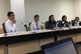 The Independent Review Committee for the hepatitis C outbreak at Singapore General Hospital delivers its findings at a press conference.