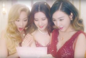 TaeTiSeo in the music video for their Christmas single Dear Santa.