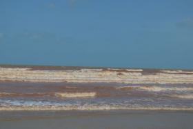 The sea off the coast of Kuantan, Pahang turned red after a severe downpour on Sunday that lasted for more than a day.