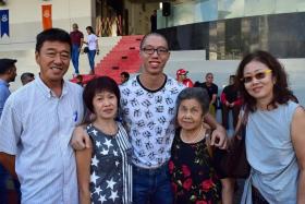 SCDF posted a follow-up photo depicting a smiling recruit and his family after a photo of a BMTC recruit went viral.