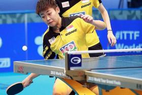 DYNAMIC DUO: Junior players Lin Ye (above) and Zhou Yihan beat Feng Tianwei and Yu Mengyu in the SEA Games women&#039;s doubles.