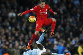 STEP UP: Roberto Firmino (above, jumping over Manchester City&#039;s Eliaquim Mangala) is a man for big matches, like when he helped Liverpool to a 4-1 win over City in November.