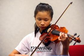 UNBOWED: Despite her loss of vision, Miss Soon excels in playing the violin.