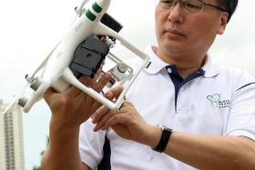 DRONE: Mr Pang Kin Keong checking out the DragonFly.