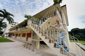 FOLLOW ME: Mr Bilyy Koh, 61, who has lived in this block in Dakota Crescent for 57 years, will be co-guiding walking trails of the estate next month.