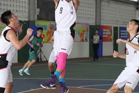 TOP SCORER: Dunman Secondary School&#039;s Mohamad Shukri Manaf (above) scores a game-high 18 points against Bedok Green Secondary.