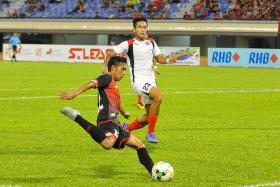 PACEY: Brunei DPMM&#039;s Maududi Hilmi&#039;s (far left) speed and versatility have caused many S.League teams problems, including Home United (in white).
