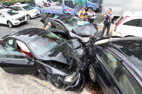 DESTROYED: Two were taken to the hospital in the six-car accident in Yishun. 