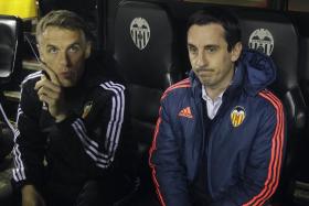 Gary Neville (right) was sacked by Valencia after taking on the head coach role for 120 days.