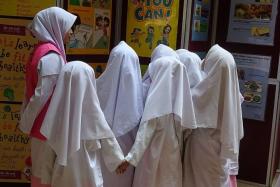 HURT: A Madrasah Al-Ma&#039;arif Al-Islamiah teacher said on Facebook that one of the girls was kicked while the other two were hit with a bag containing a heavy item.
