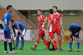 OPTIMISTIC: Singapore captain Enrico Marican (left) believes his team still have room for improvement.