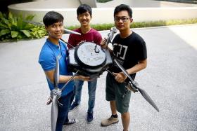 TEAMWORK: The SUTD team and their Unmanned Aerial Vehicle.