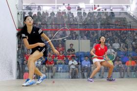CALM AND COMPOSED: RI&#039;s Annabelle Lim (above left) dished out an assured performance against her NJC counterpart Lee Ying Xi to seal first place for her team. 
