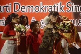 FAMILY: SDP&#039;s Dr Chee Soon Juan hugging his mother.