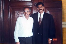 INSPIRED: Mr Muralidharan Pillai with his father P.K. Pillai in a 1996 photo (above).