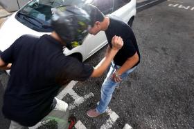 ATTACK: In Muhammad Fuad Kamroden&#039;s first instance of road rage, he head-butted and punched a man.