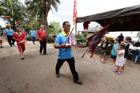 CELEBRATION: Tua Pek Kong deity from Loyang Tua Pek Kong Temple was invited to join in the festivities on Pulau Ubin. 
