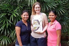 THE WRITE SOLUTION: Author Rowena &#039;Frog&#039; Michaels with her Filipino maids, Ms Maricon Espiritu (left) and Ms Ginalyn Narag. 