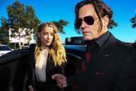 IT&#039;S OVER: Amber Heard and Johnny Depp were married for 15 months.