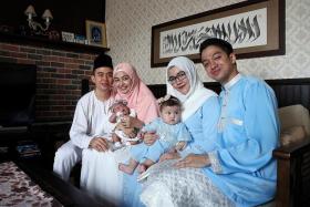 REUNITED: (From left) Alif Abdullah and wife Azzah Fariha Samat with their baby Alana. Syarif and his wife Malaque Mahdaly with their baby Selma Malika.