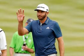 MAN TO WATCH: American Dustin Johnson (above) has a good record at the British Open. 