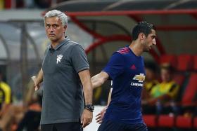 LETDOWN: Jose Mourinho&#039;s (left) new signing Henrikh Mkhitaryan (right) was a passenger other than his second-half tap-in.