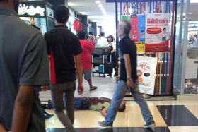 SHOCKING SIGHT: (Above) The injured man was found lying in his own blood in Northpoint Shopping Centre.  