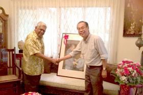 PROUD: Mr Chung presented the painting to Mr Nathan at his home on his 90th birthday. 