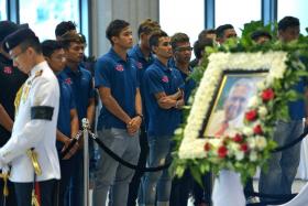 Footballers from Home United pay their last respects to former President S R Nathan.