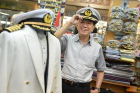 DYING TRADE: Mr Ken Chow at his shop in Peninsula Shopping Centre (above) and with some of the items he sells.