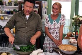 COOKS: Lindsay Lohan and Jamie Oliver on his cooking show, Jamie And Jimmy&#039;s Friday Night Feast. 